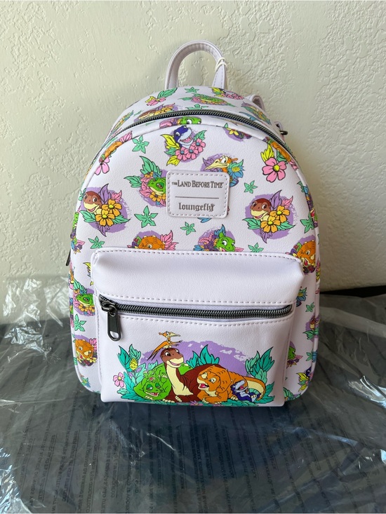 Loungefly Handbags - *RARE* Loungefly The Land Before Time Dinosaurs Floral Mini Backpack - NWT